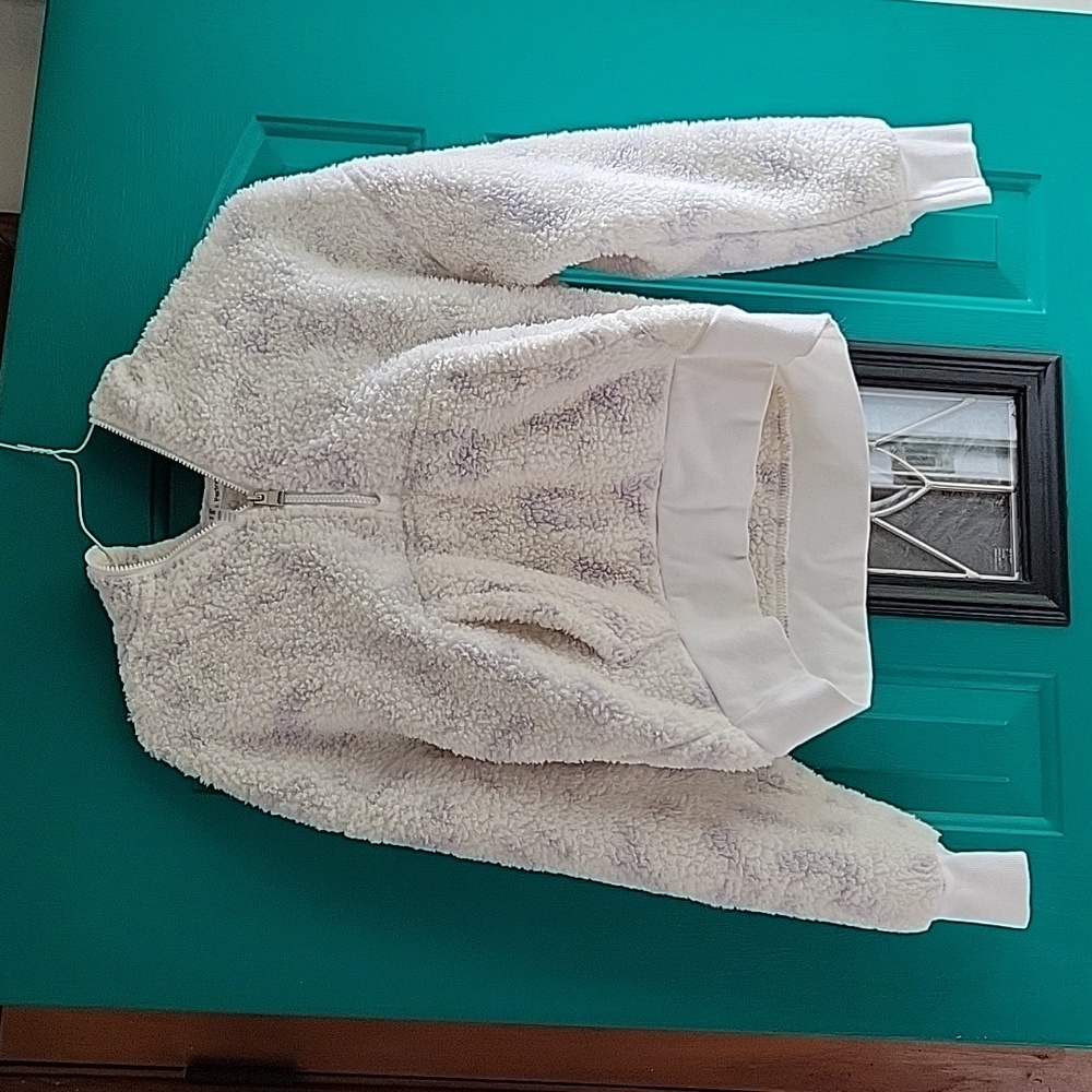 Calvin Klein hoodie. Children's Small. Cream with purple spots. Half zip.